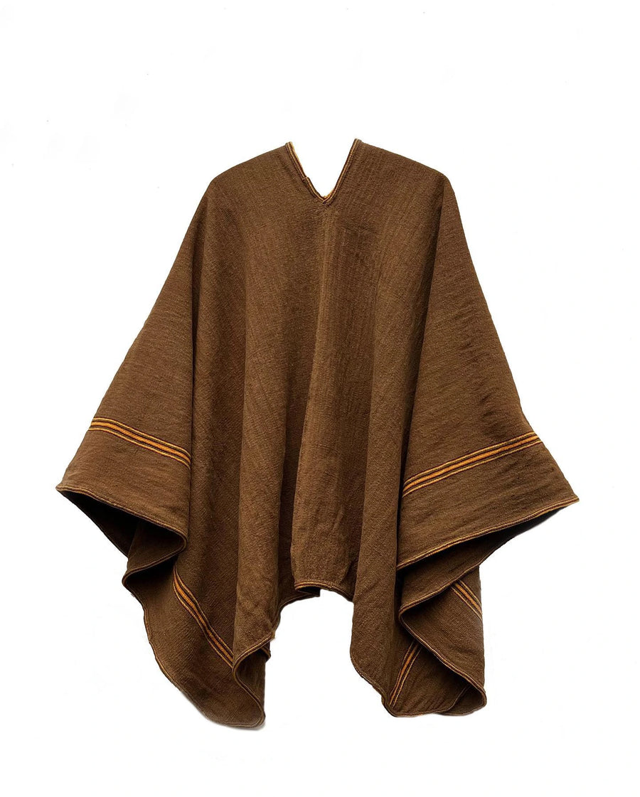 Brown Peruvian handwoven alpaca wool poncho with yellow decorative trim on white background